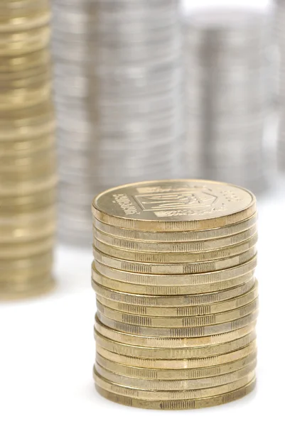 stock image Stacks of coins isolated on white