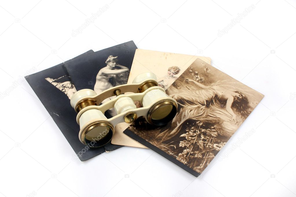Old cards and opera glasses