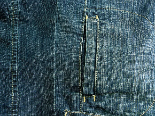 Jeans in cotone blu con tasca, come sfondo — Foto Stock