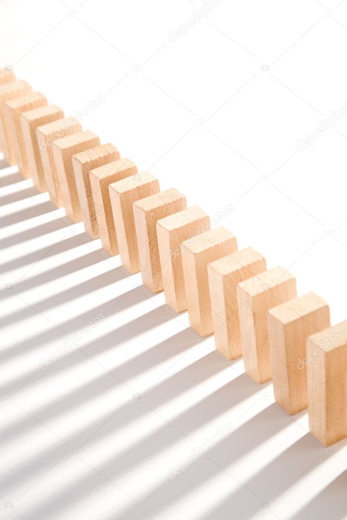 Dominoes in a row, isolated on white