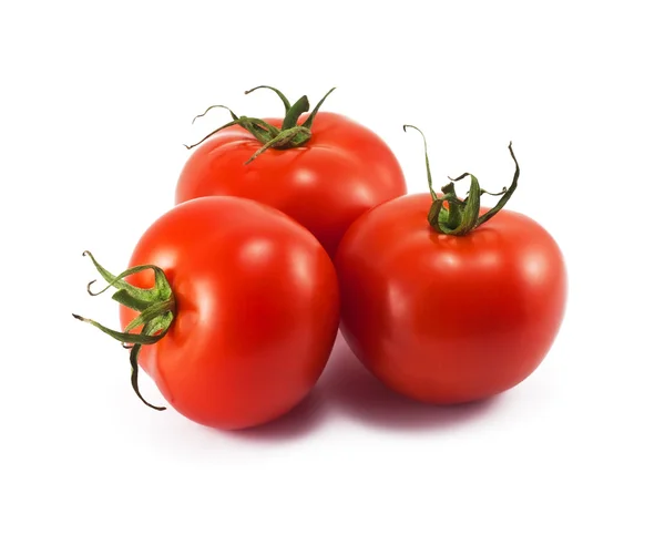 Trzy czerwone pomidory świeże na białym tle — Zdjęcie stockowe