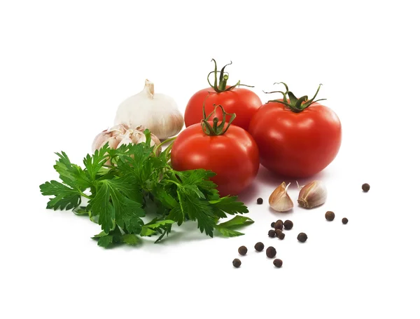 Tomates, alho e salsa sobre fundo branco — Fotografia de Stock