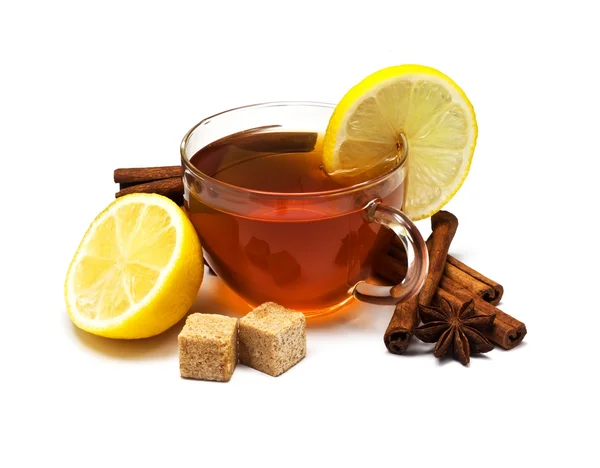 Black tea with lemon and cinnamon — Stock Photo, Image
