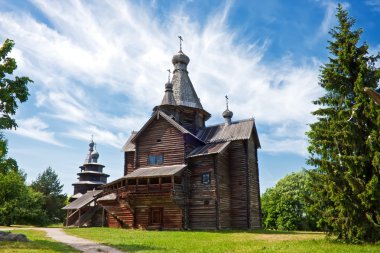 Old wooden chapel in village clipart