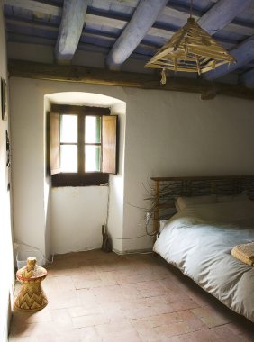 Rustic Bedroom In Traditional Farmhouse clipart