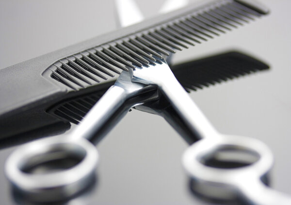 Scissors And Comb For A Hairdresser