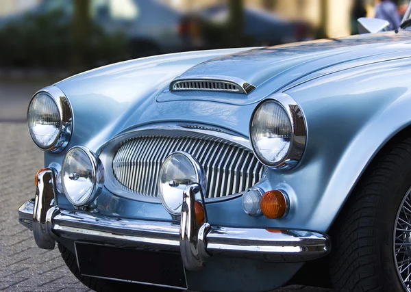 A classic shiny metallic blue sports car — Stock Photo, Image