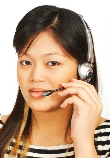 电话销售女人浅谈耳机 — 图库照片
