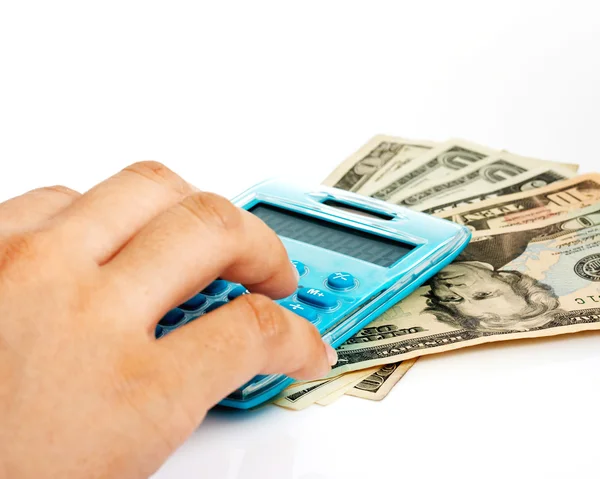Calcular un saldo en efectivo con una calculadora — Foto de Stock