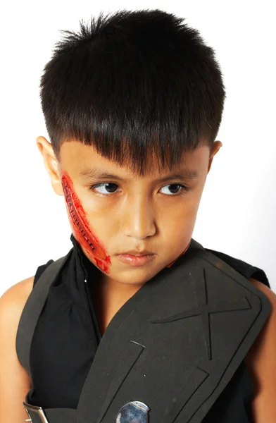 Junge im Kostüm mit falscher Narbe — Stockfoto