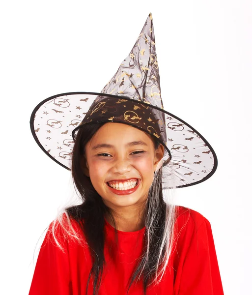 Schattig meisje, gekleed als een heks — Stockfoto