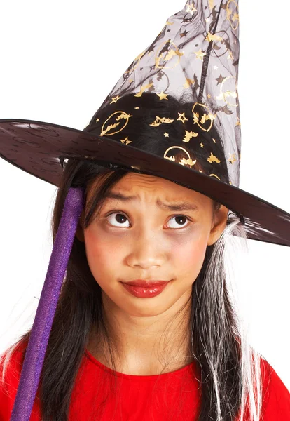 Fantasia de bruxa em uma menina pequena — Fotografia de Stock