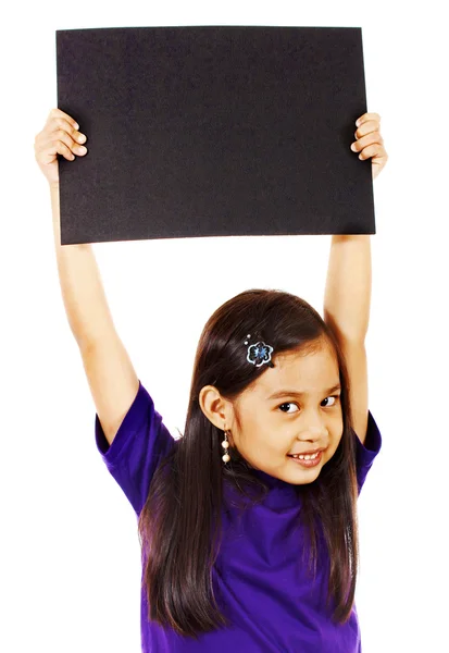 女孩举起一个空白板 — 图库照片