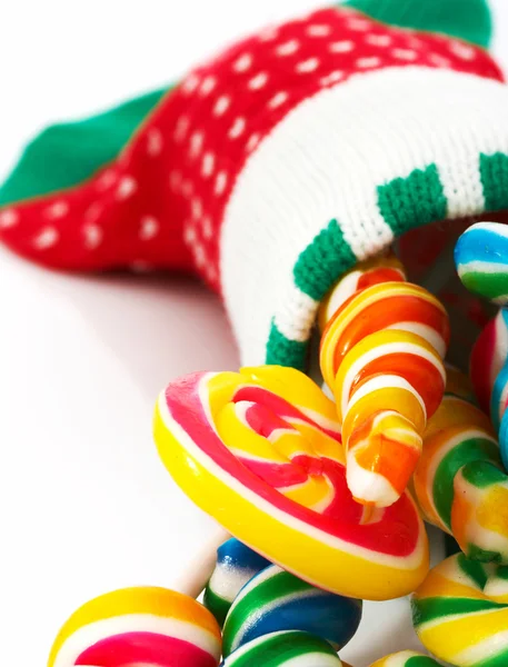 Caramelos en un calcetín de Navidad — Foto de Stock