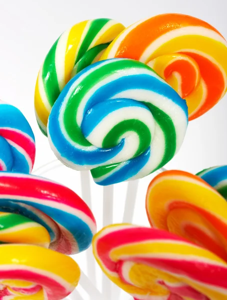 Twisted Multicolored Candy On Sticks — Stock Photo, Image