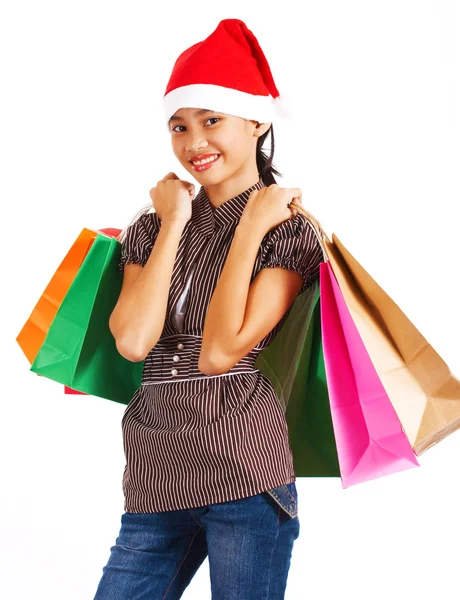 Kerstmis meisje terug uit winkelen Stockfoto