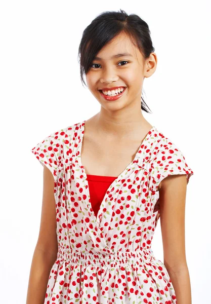 Teenager in einem hübschen Kleid lächelt — Stockfoto