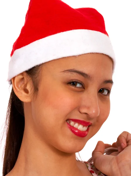 Χαρούμενη κοπέλα φορώντας ένα καπέλο Χριστούγεννα — Φωτογραφία Αρχείου