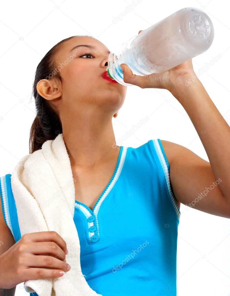 Thirsty Girl Drinking Water After Exercise