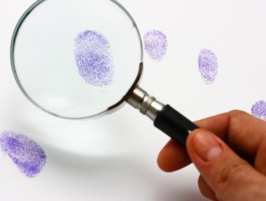 Police Examine A Fingerprint clipart