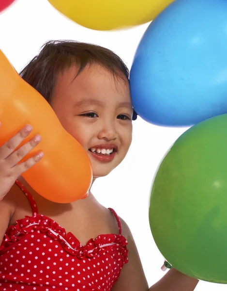 快乐的女孩有很多的气球 — 图库照片