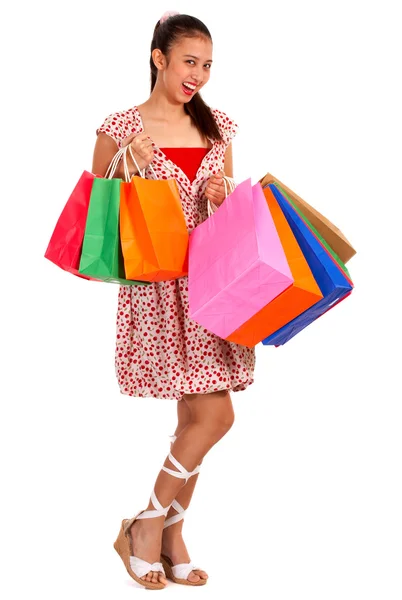 Menina feliz com suas compras — Fotografia de Stock
