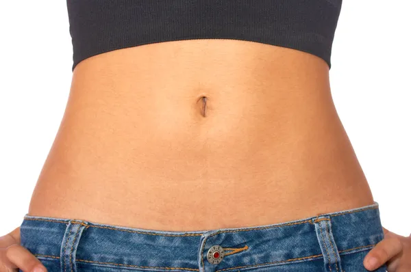 Ploché břicho na zdravou dívku — Stock fotografie
