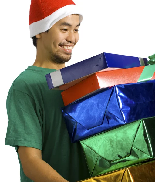 Sürü hediye taşıyan adam — Stok fotoğraf