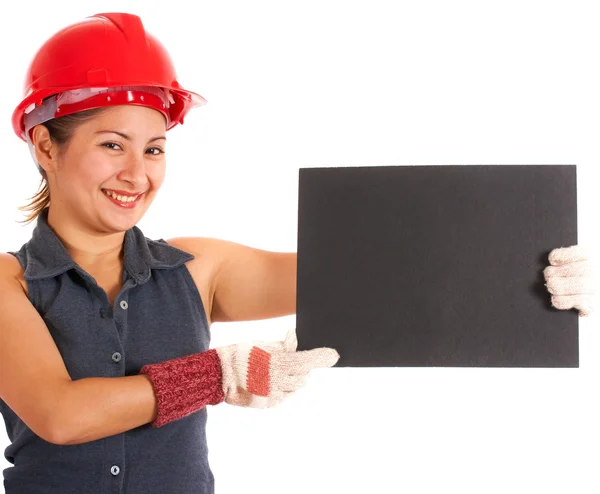 Trabalhador da construção segurando uma placa em branco — Fotografia de Stock