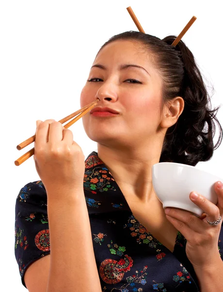 Японські дівчата їдять з Чоп палички — стокове фото