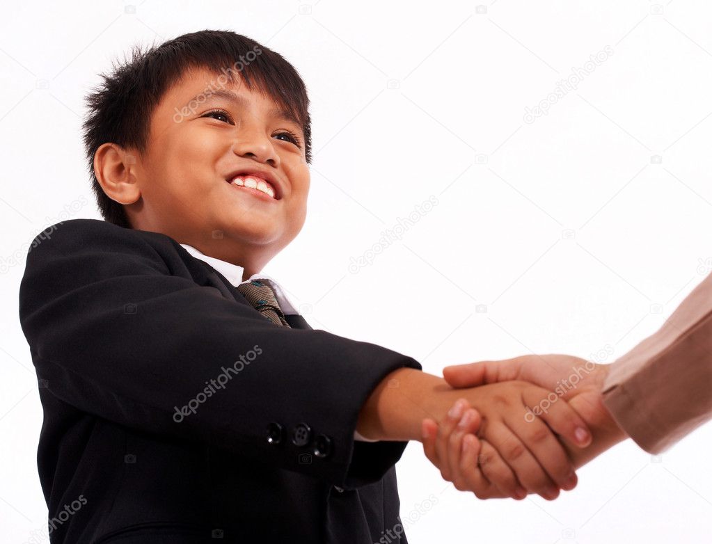 Formal Boy Shaking Hands With An Adult