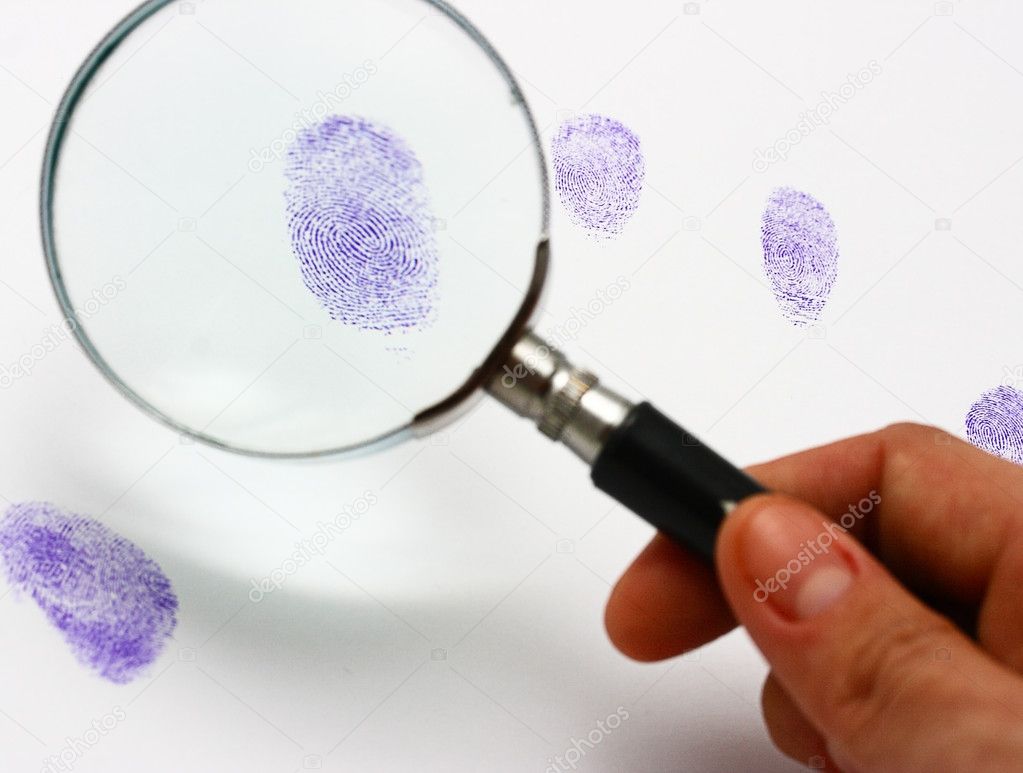 Police Examine A Fingerprint