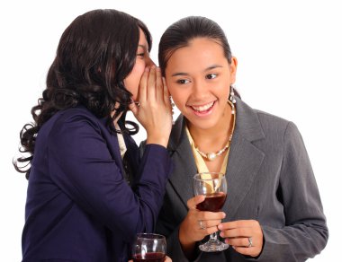 Two Female Officemates Sharing A Secret clipart
