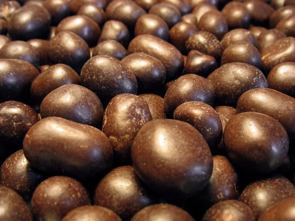 Jordnötter i kakao (choklad). Närbild — Stockfoto