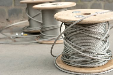 Spools of unused steel wire clipart