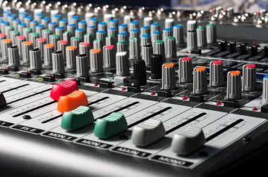 Studio mixer with sliders and buttons clipart