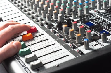 Sound mixer with hand using slider clipart