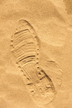 Shoeprint in the sand clipart
