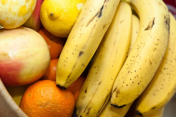 stock image Orange, banana, and otherfresh fruits in wooden dish