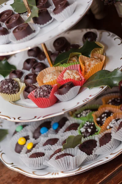 En platta av choklad och andra godsaker — Stockfoto
