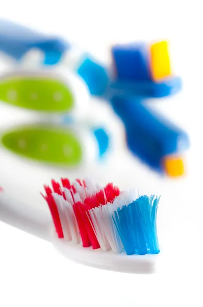 Close-up colorful toothbrush on a white background — Stock Photo, Image