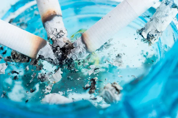 Closeup of ashtray and cigarettes — Stock Photo, Image