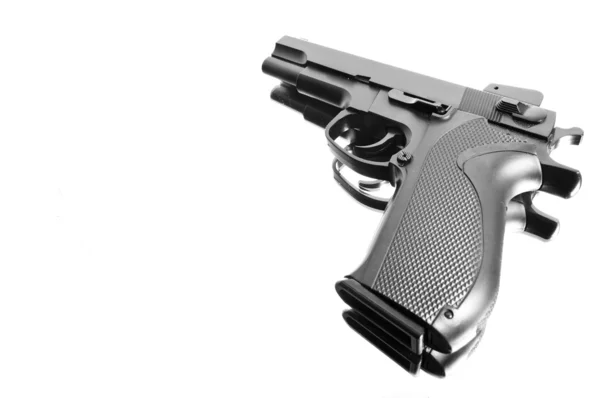 Kąt widzenia pistolet na białym tle nad białym — Zdjęcie stockowe