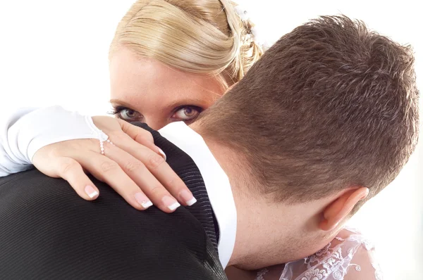 Bride leaning over groom — Stock Photo, Image