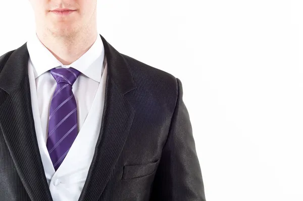 Νεαρό buisnessman με μοβ γραβάτα σε άσπρο φόντο — Φωτογραφία Αρχείου
