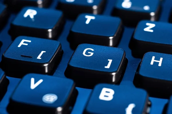 Botões azuis de um teclado de um computador — Fotografia de Stock