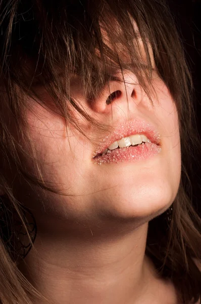 Mädchen mit Zucker auf den Lippen — Stockfoto