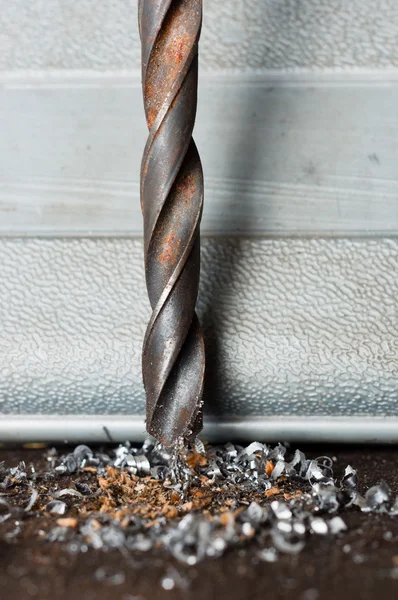 Closeup of a rusty drill-bit with burr under it — Stock Photo, Image