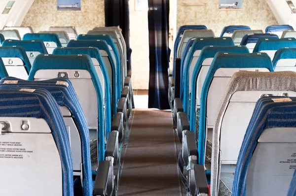 Old seats of an annuated airplane — Stock Photo, Image