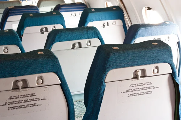 Old seats of an annuated airplane — Stock Photo, Image